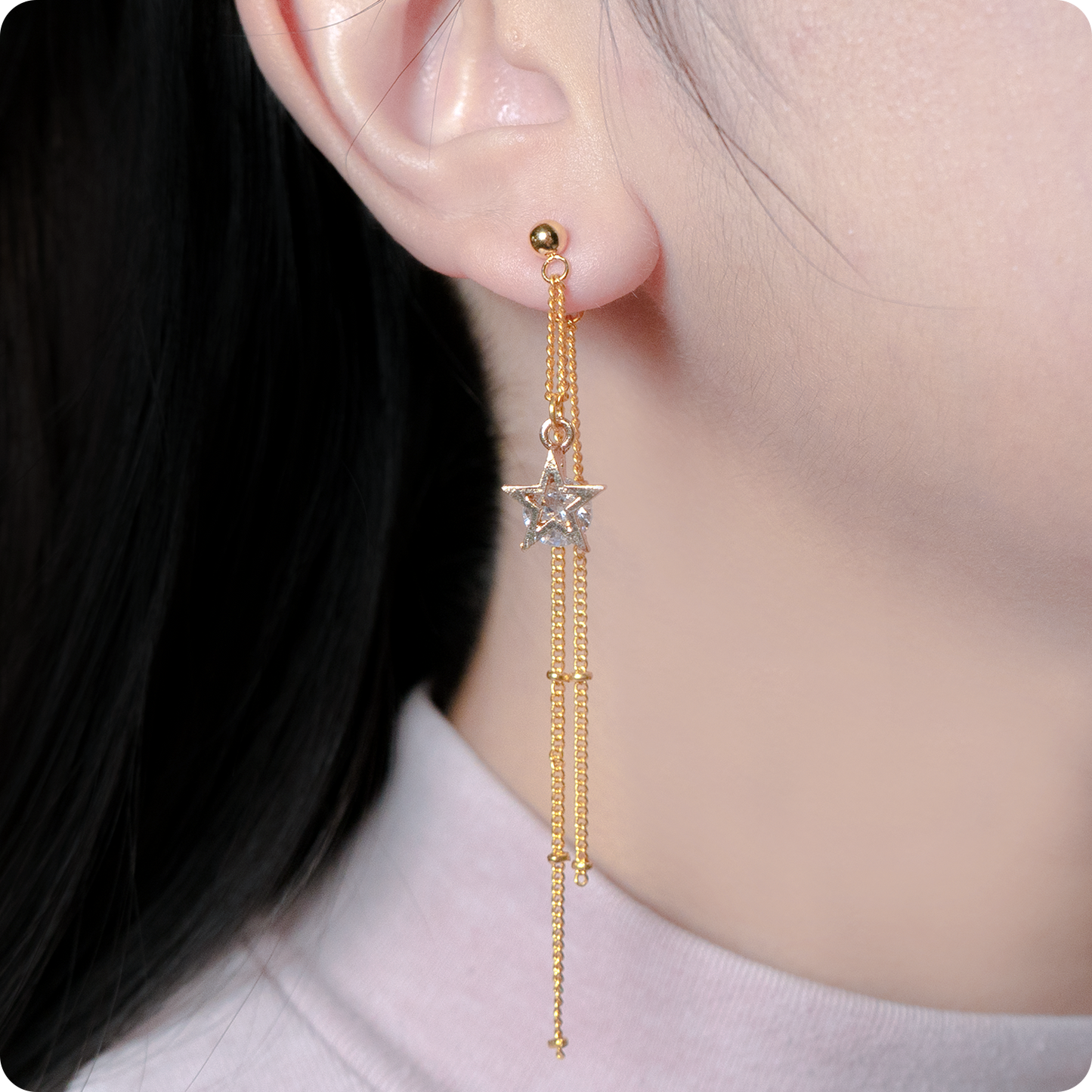 Celeste Faerie Estrella Earring close up shot on woman's ear