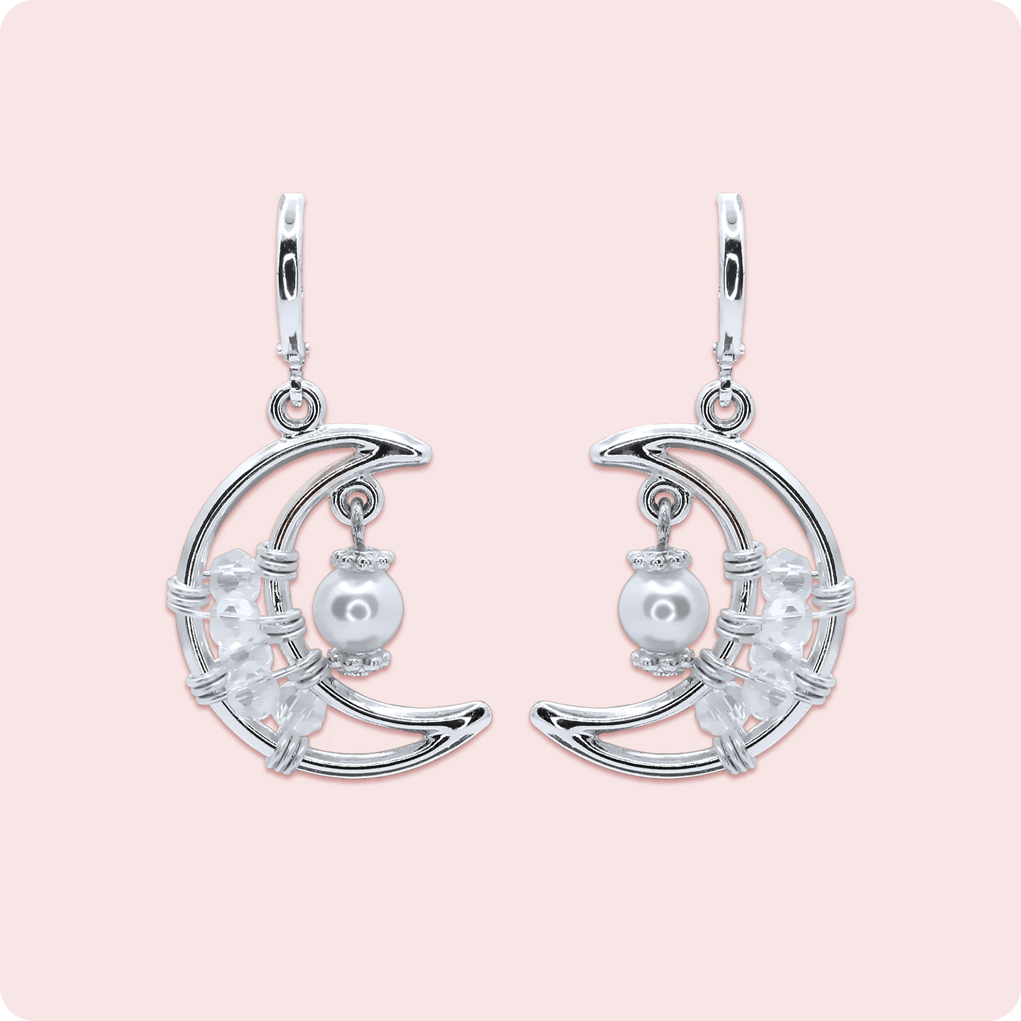 Celeste Faerie Luna Earrings close-up on pink background