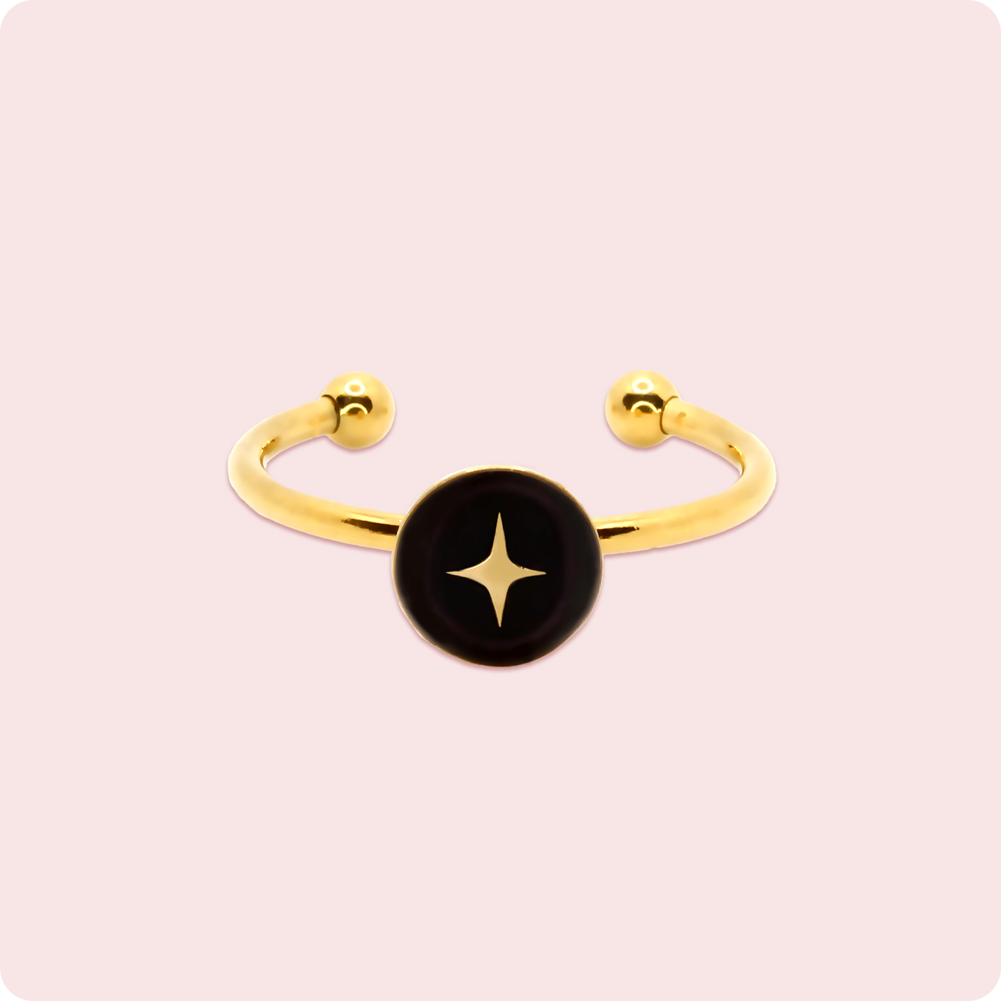 Celeste Faerie Gold Estrella Ring close-up on pink background