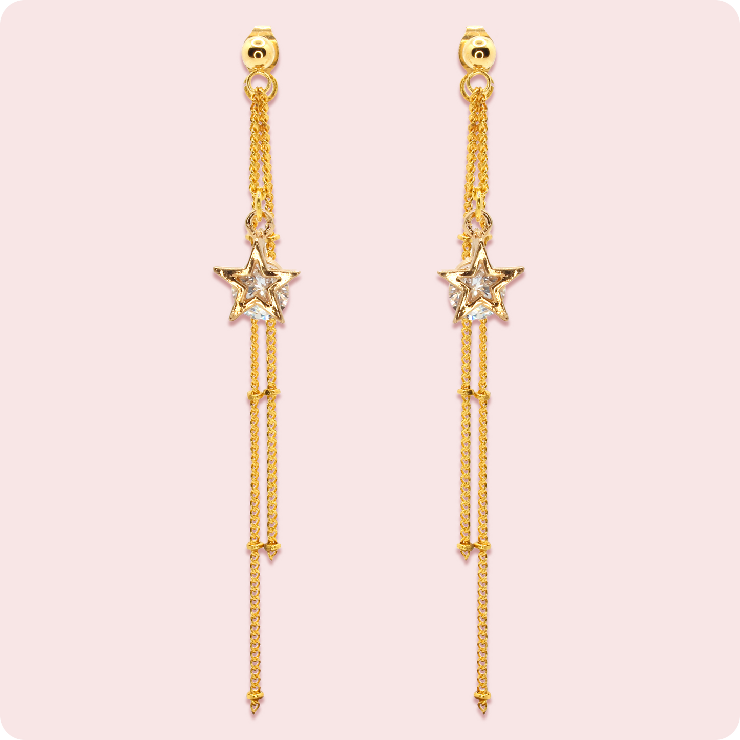 Celeste Faerie Estrella Earrings close up on pink background