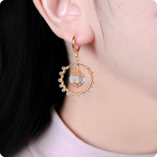 Celeste Faerie Sol Earrings close-up on ear